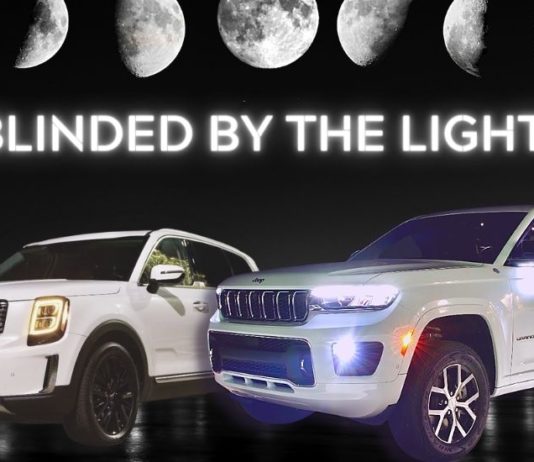A 2022 Jeep Grand Cherokee L vs 2022 Kia Telluride during a headlight brightness competition.