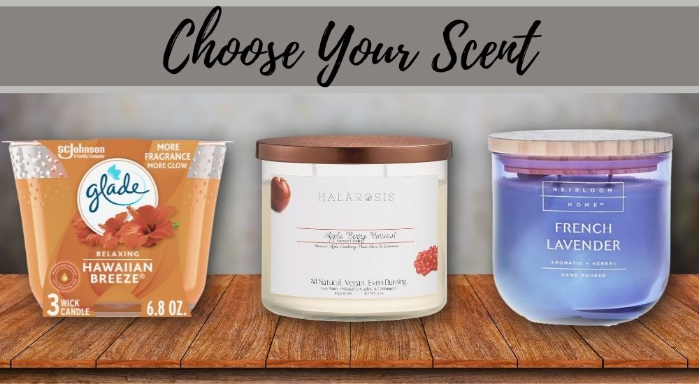 Three candles are shown from the front with the text "choose your scent" displayed above them.