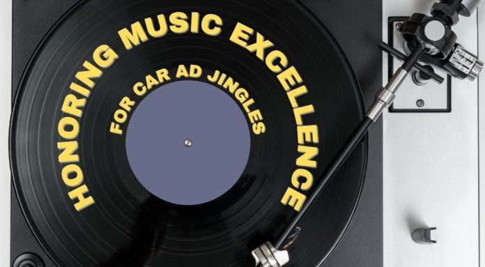 A record player is shown from above after Tomball car dealerships nominate a musical composer for an award.