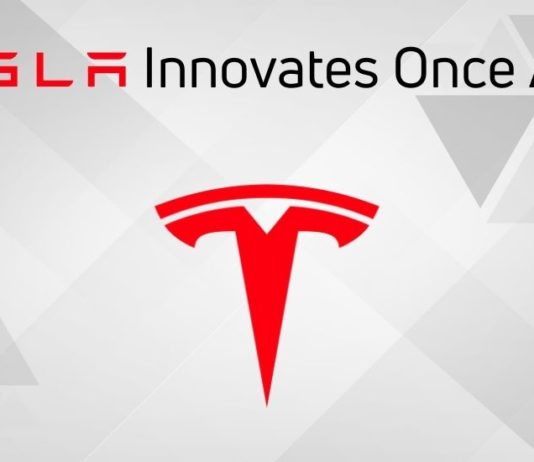 A red Tesla emblem is shown.
