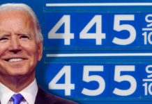Joe Biden is shown in front of a sign for gas prices after allegedly infiltrating used car dealers.