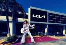 Elvis is shown standing outside of a King of Prussia Kia dealership.