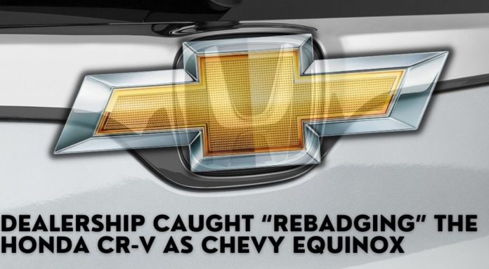 A Honda badge is shown with a Chevy badge pasted over it during the battle of the 2022 Chevy Equinox vs the 2022 Honda CR-V.