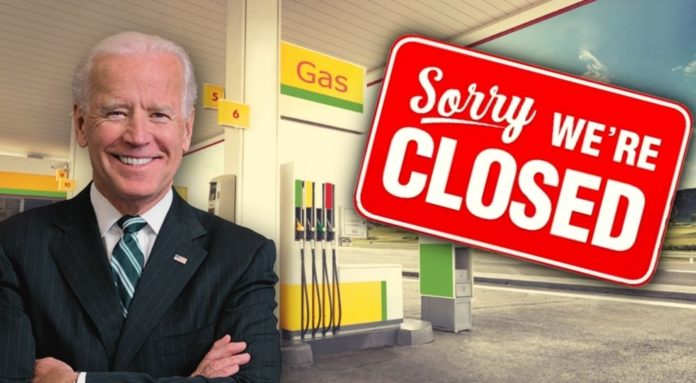 Joe Biden is shown in front of a closed gas station near a Murfreesboro used car dealer.