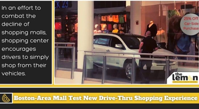 A white SUV is shown inside of a Boston area mall.