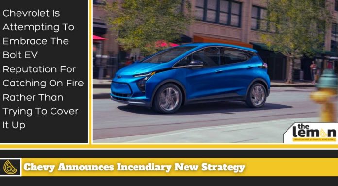 A blue 2023 Chevy Bolt is shown from the front at an angle.