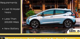 A blue 2022 Chevy Bolt is shown from the side after leaving a Certified Chevy dealer.
