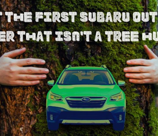A green 2022 Subaru Outback is shown from the front in front of a tree after leaving a Subaru Outback dealer.