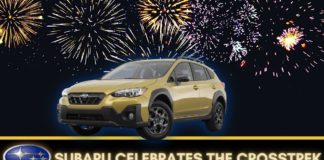A green 2023 Subaru Crosstrek is shown from the front at an angle while parked in front of fireworks after leaving a dealer that has a Subaru Crosstrek for sale.