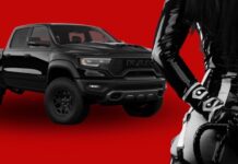 A dominatrix is shown in front of a 2022 Ram 1500 TRX after leaving a tire center.