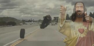 Jesus is shown giving thumbs up to an automobile accident during live auto news.