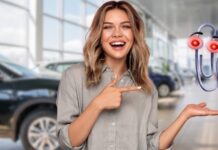 A woman is shown holding an evil Clippy at a Chevy Silverado 1500 dealer.