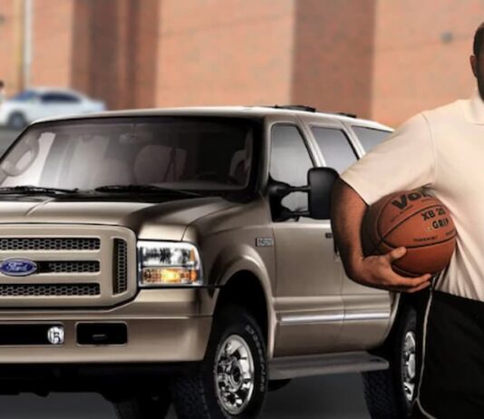 A basketball coach is shown standing near a brown 1999 Ford Excursion trying to find used SUVs for sale.